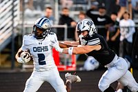 Oswego East edges out Plainfield North to remain undefeated on the season