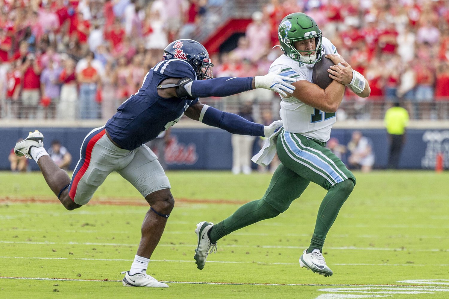 It’s time to put away all distractions, time for Rebels, Tulane to spot the ball