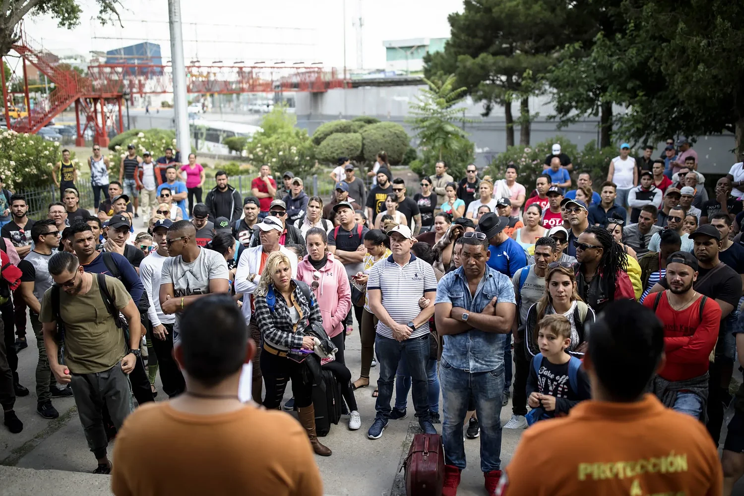 What do migrants experience when they request asylum at the Texas-Mexico border?