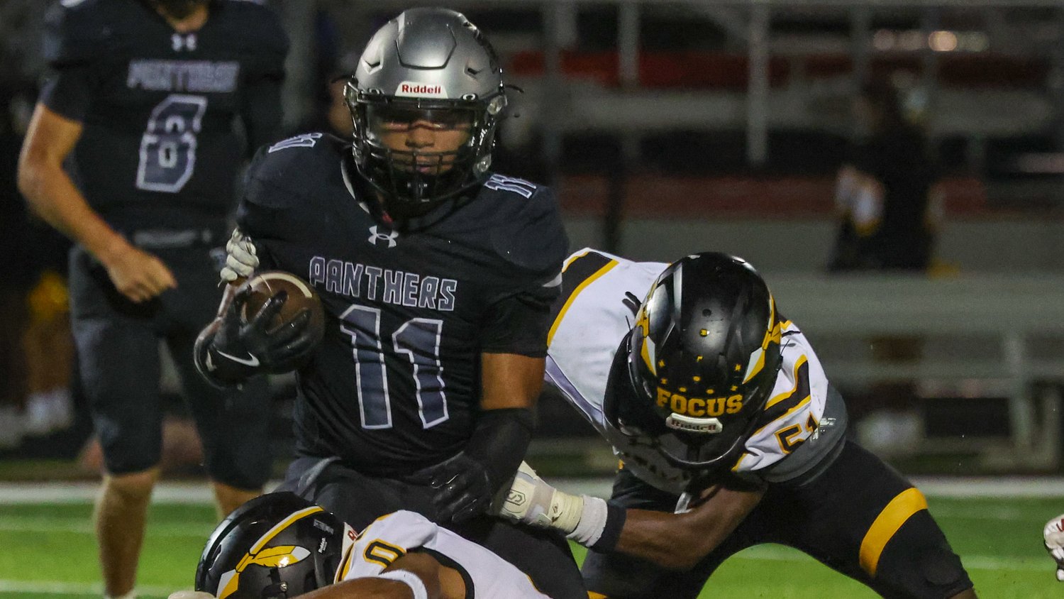 Senior scores twice on offense, once on defense to power reigning champion to 5th straight win