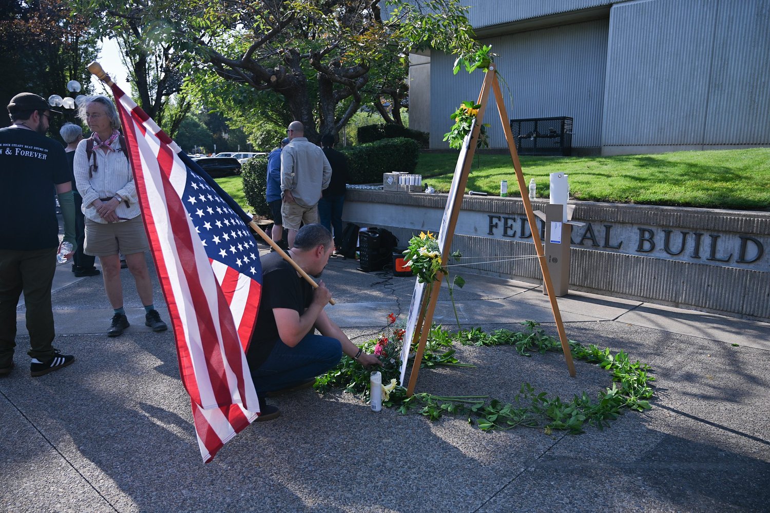 Photos: Protesters at Eugene Federal Building mourn those killed by ICE