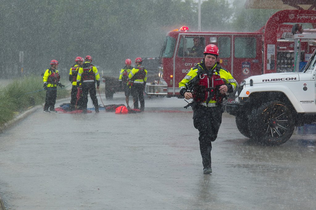 Texas flooding surges from huge rainstorms as rescuers pull people from rising waters