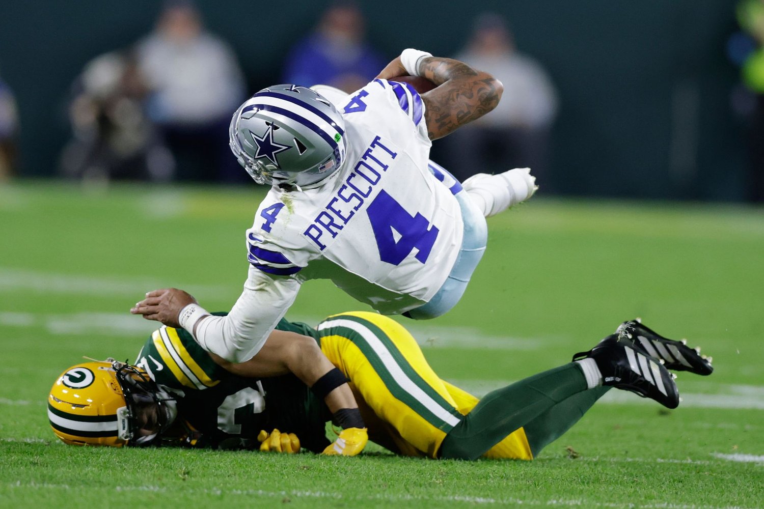 Struggling Cowboys suffer letdown on offense as their defense shows signs of progress