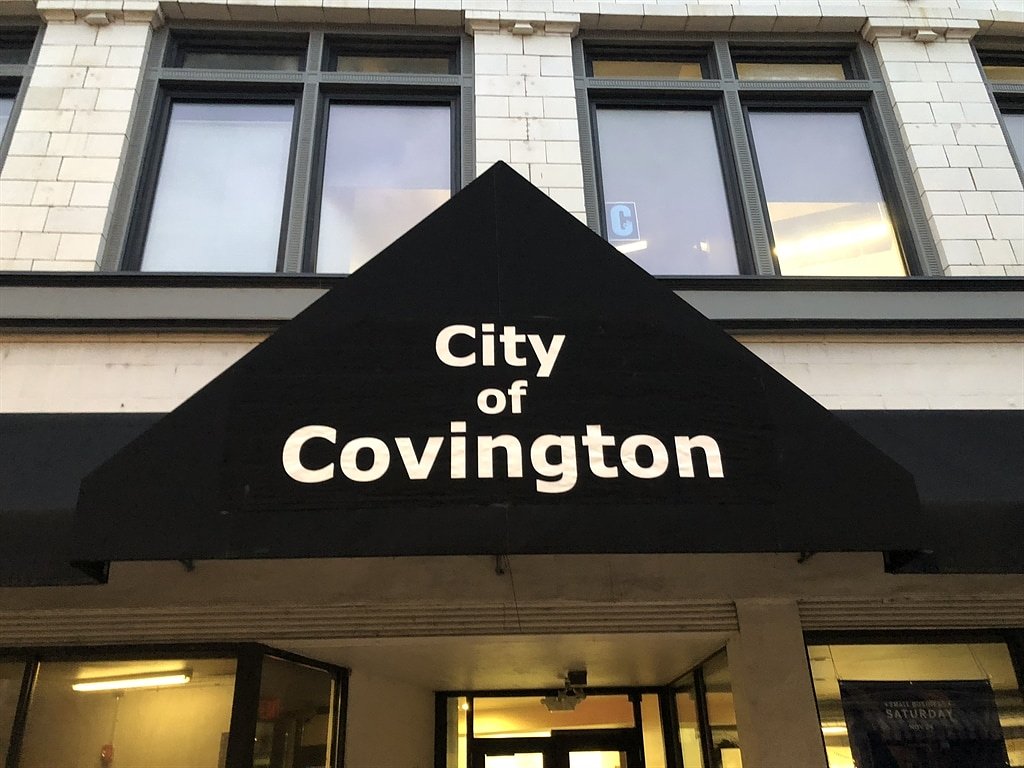 Covington considers paying off a portion of its debt early