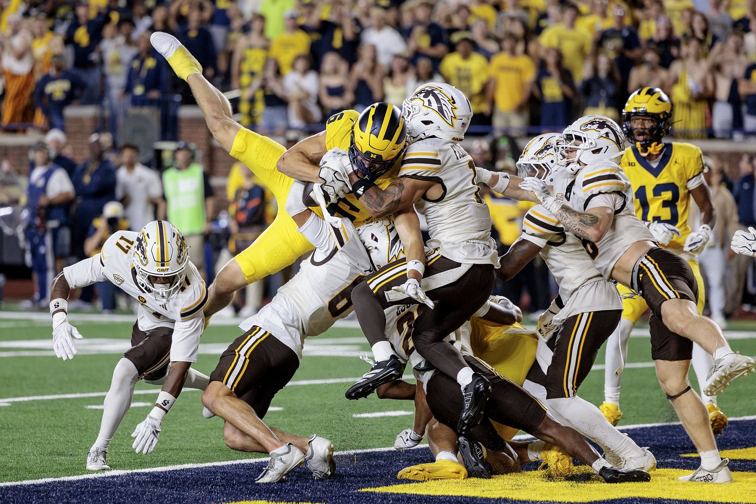 Michigan pulls off miracle Hail Mary in Whittingham’s ugly debut