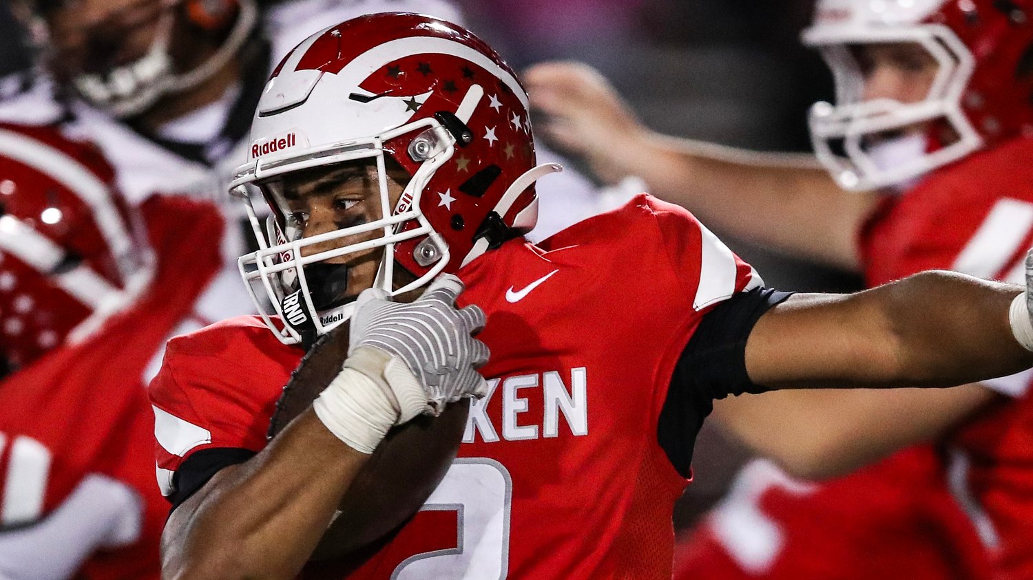 Three-touchdown night from star back powers Homecoming win and locks up home playoff game