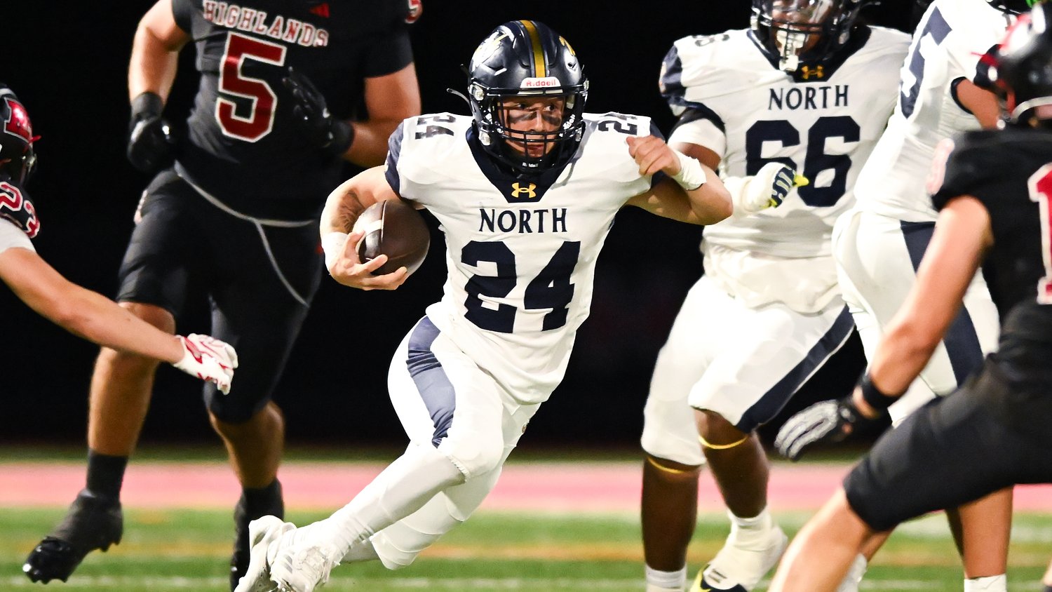 Senior football player rushes for nearly 200 yards and 6 TD in playoff quarterfinals