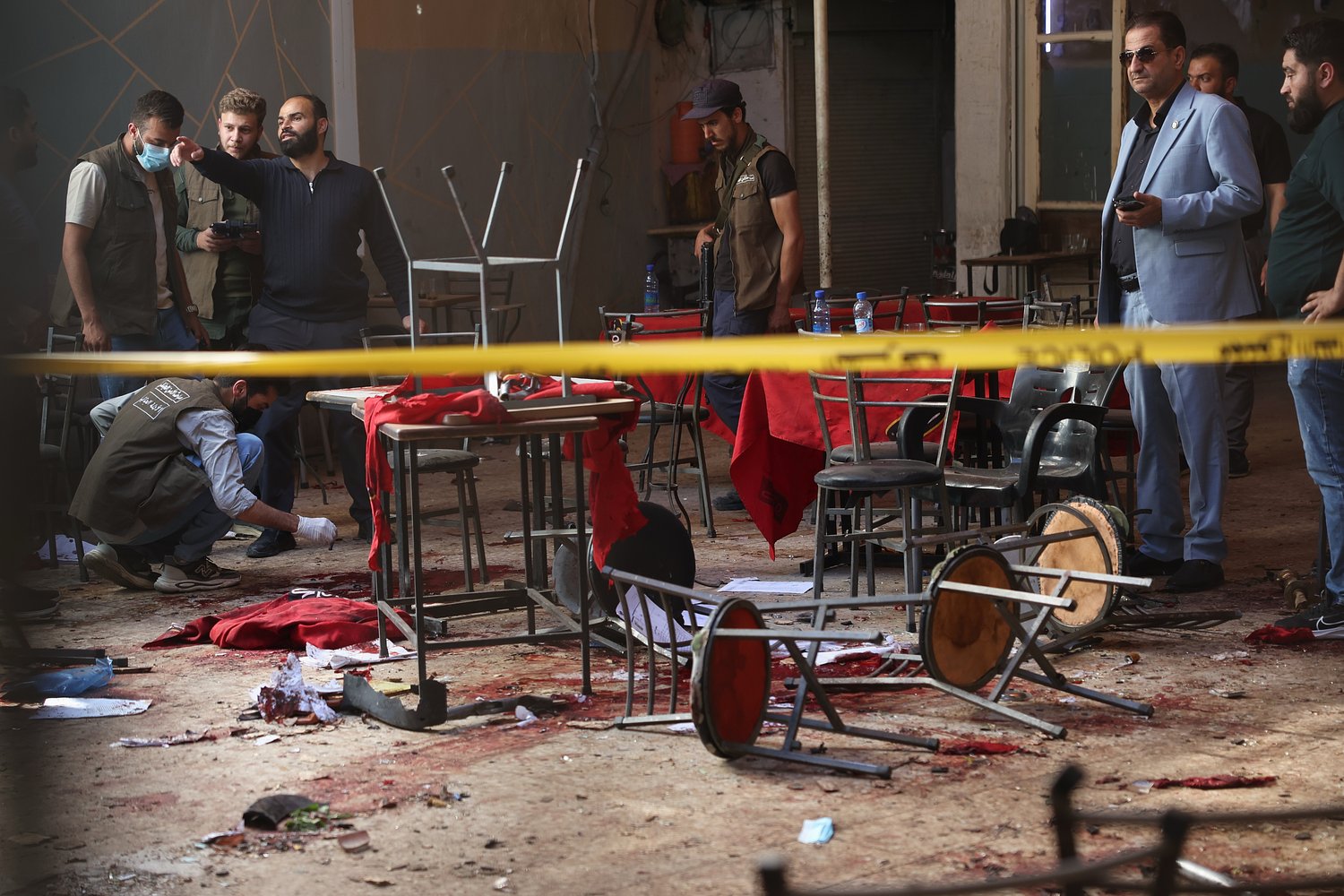 Explosive device kills at least 9 at Damascus café