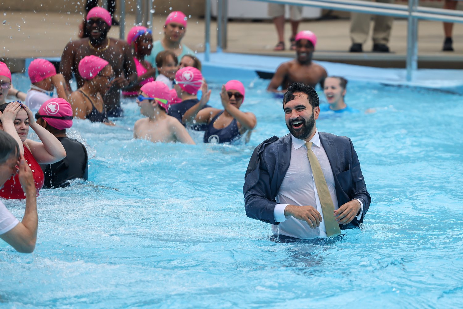 Suit and all: Mayor Mamdani jumps into NYC pool to revive old tradition