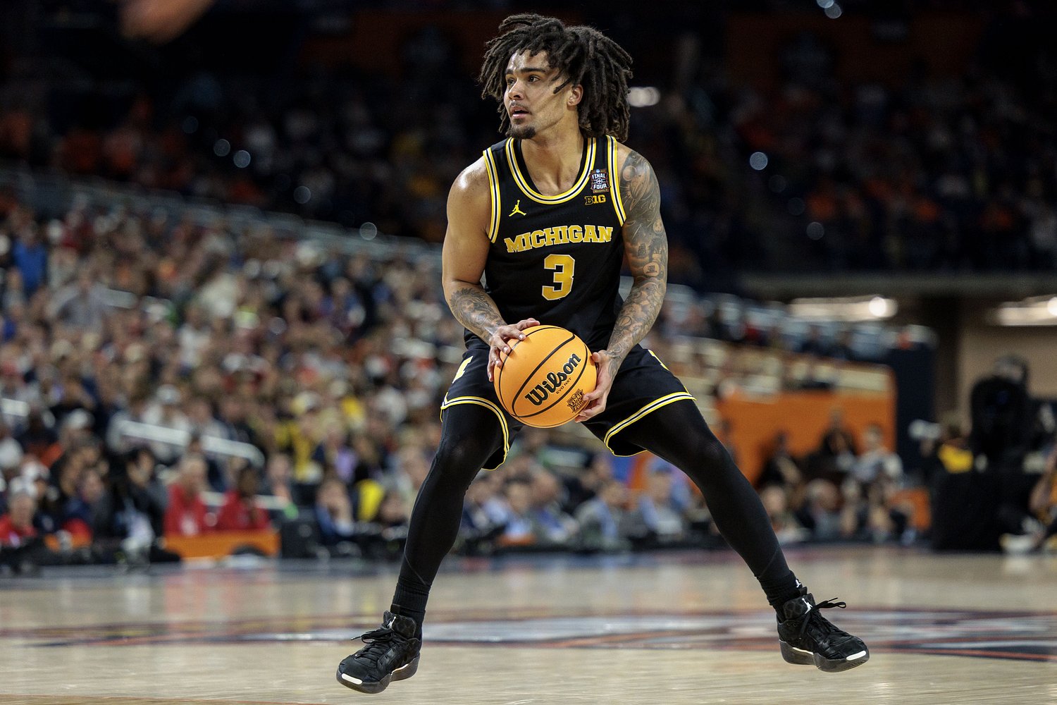 One Michigan returner takes over late, another held out again, and a former coach returns