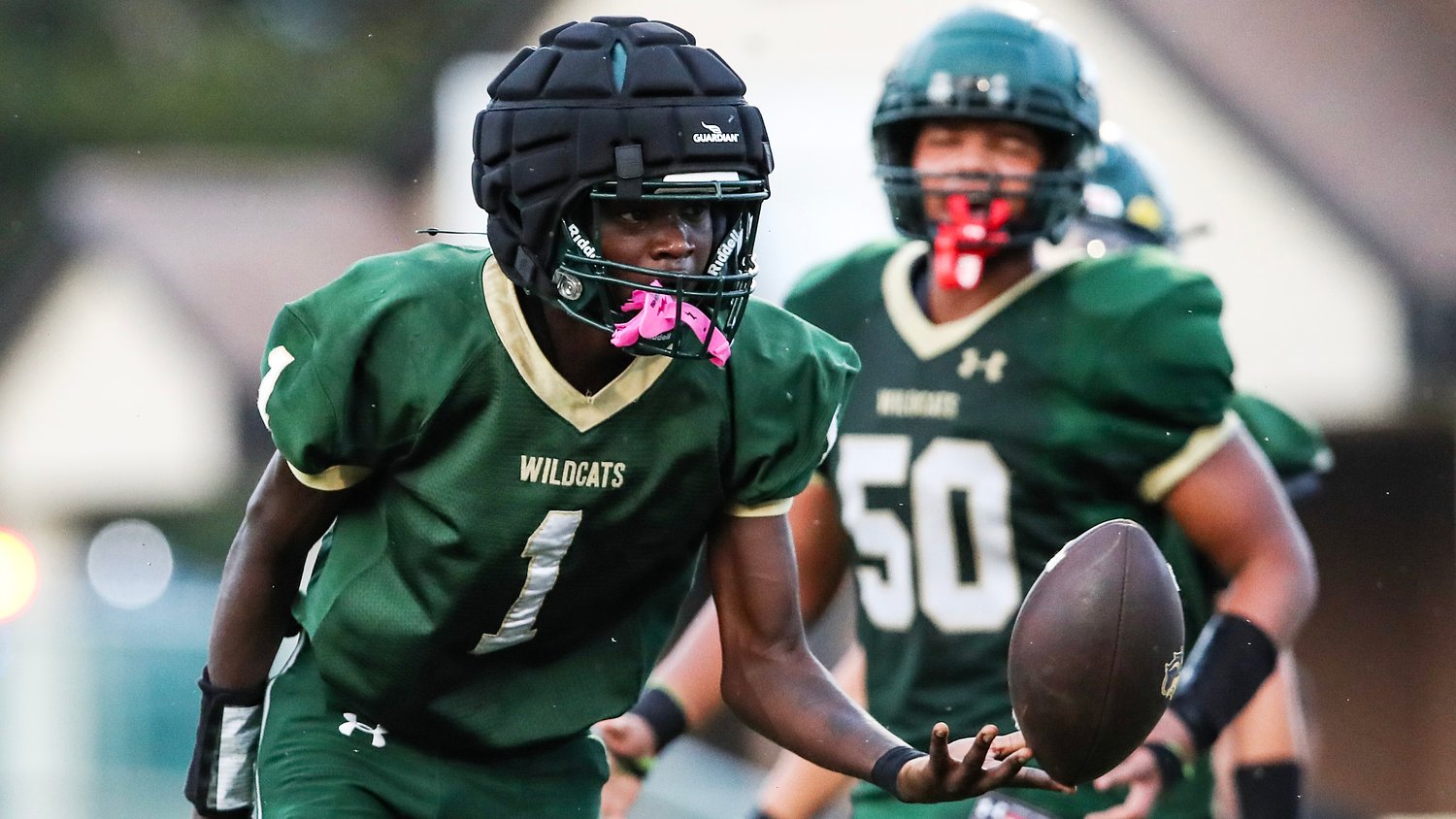 Shore team uses late TD to clinch share of division title while keeping season perfect