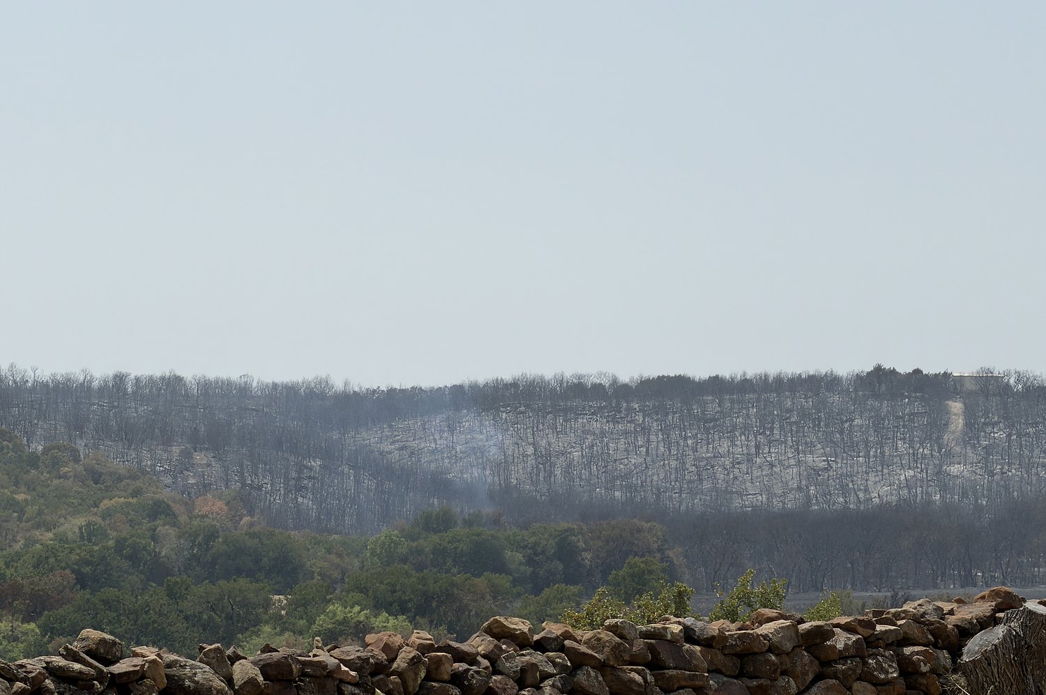Fire crews fully contains North Texas wildfire, which continues to burn three weeks later