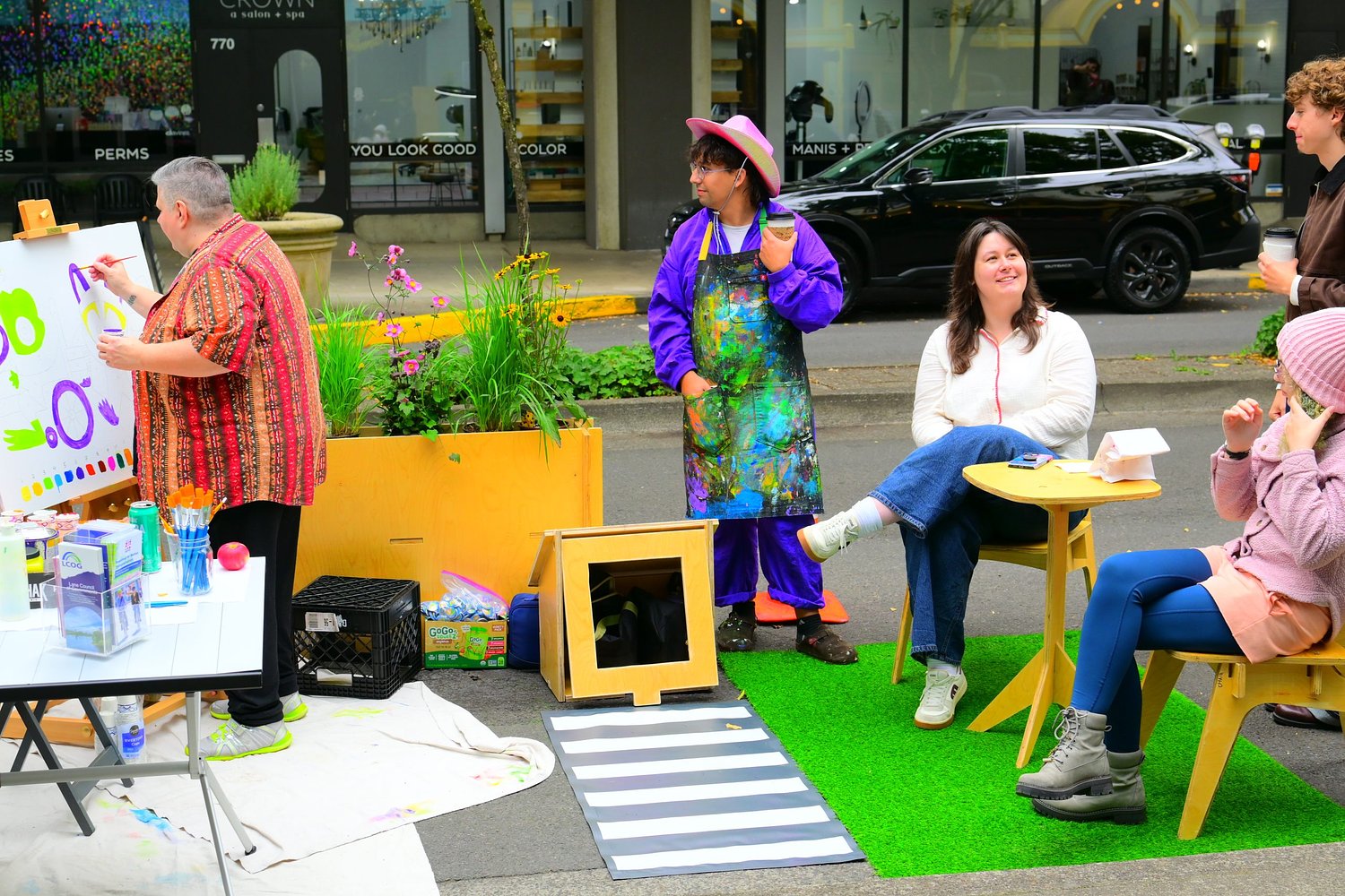 Park(ing) Day turns public car spaces into community parks in downtown Eugene