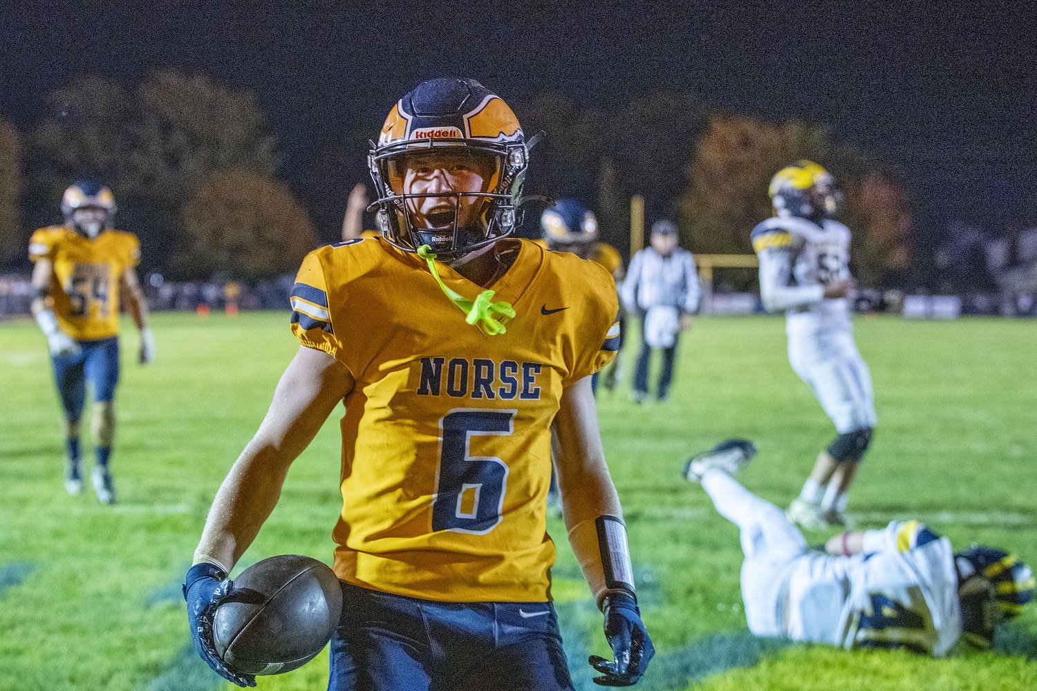 Who was the Muskegon area’s Friday night football hero for district openers?