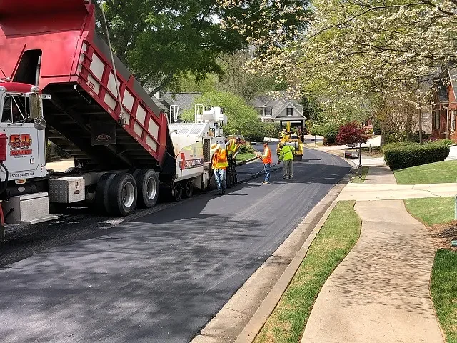 Norcross finalizes business tax hike, awards street paving contract