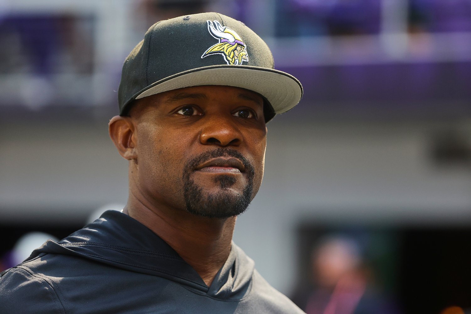 What was written about Brian Flores in a newly revealed coaching report
