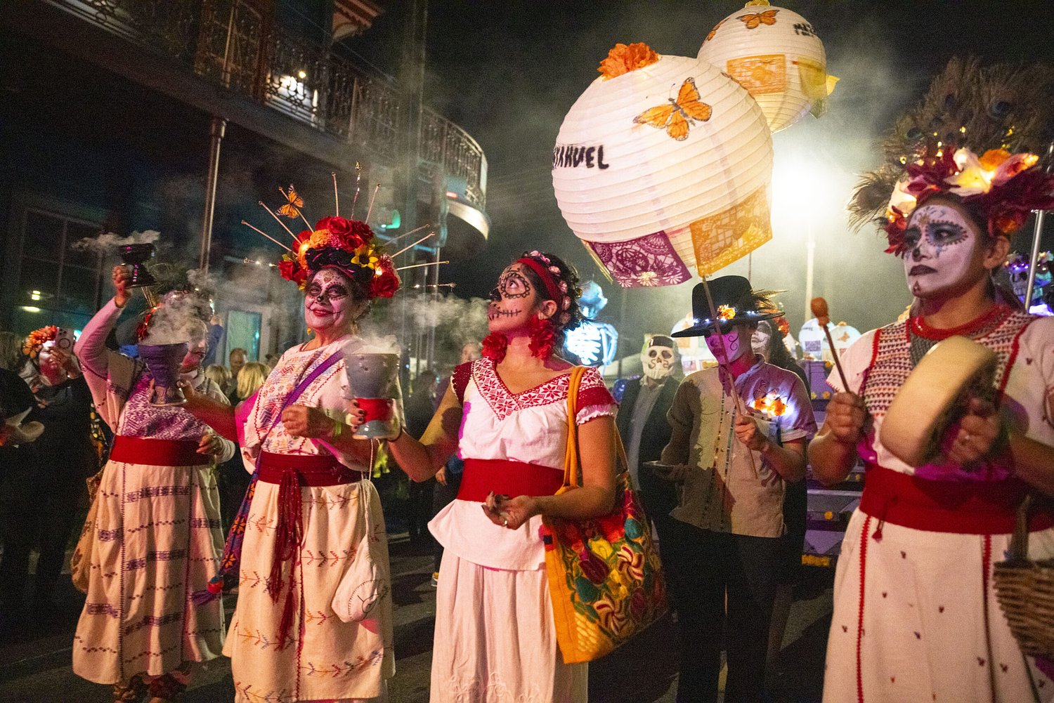 These friends are honoring the departed in a Mexican-New Orleans sort of way