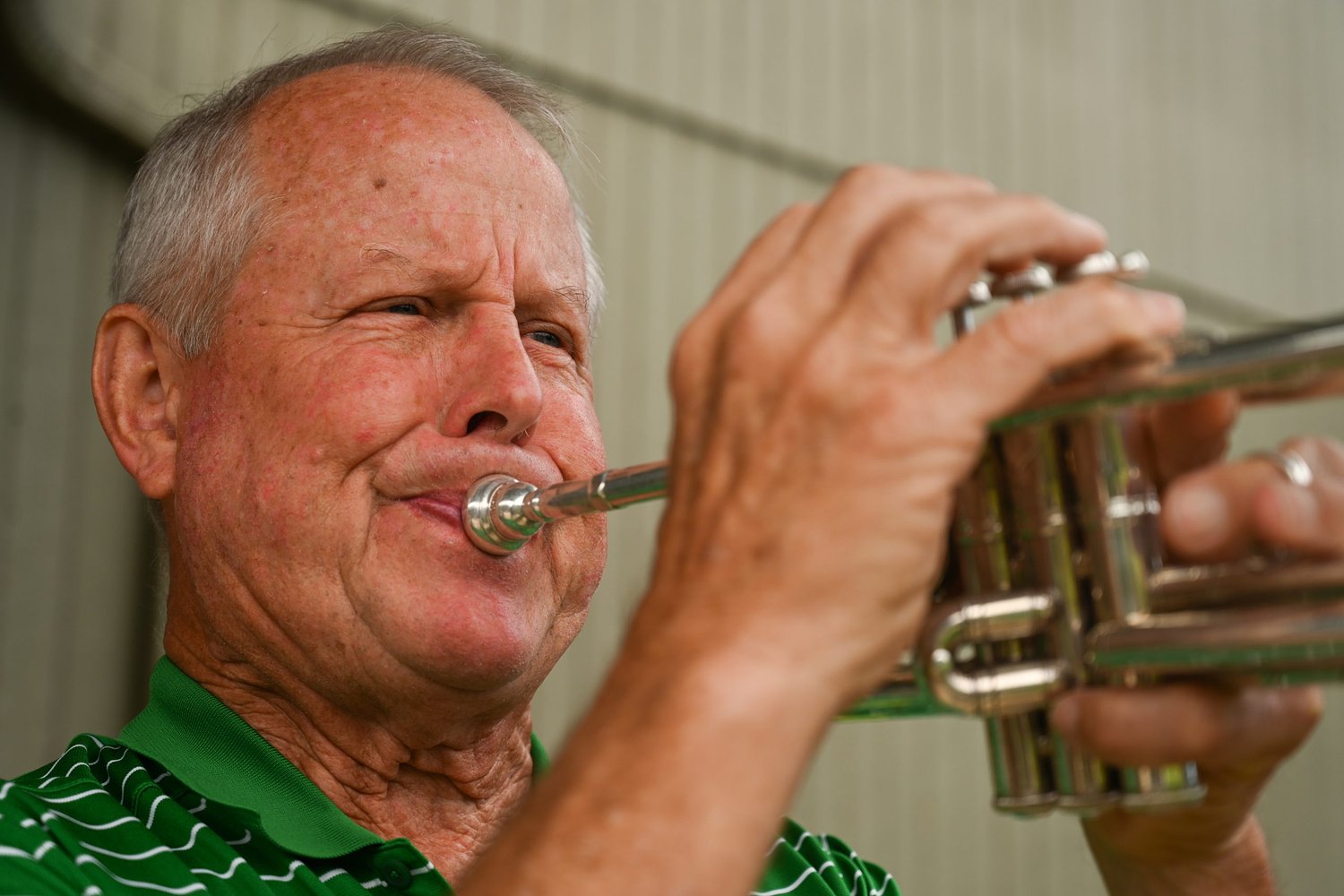 Tooting his own horn: Springfield man plays trumpet for touchdowns, anthems and funerals