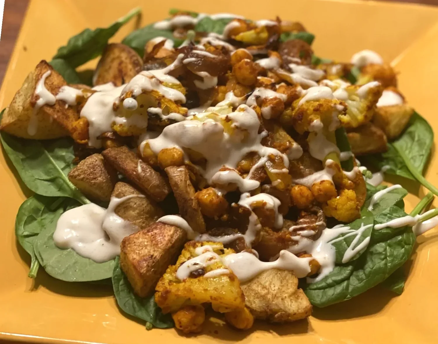 RECIPE FOR A HEALTHY PLANET: Lisa and Alex Murray – Curry Cauliflower and Peppery Potatoes