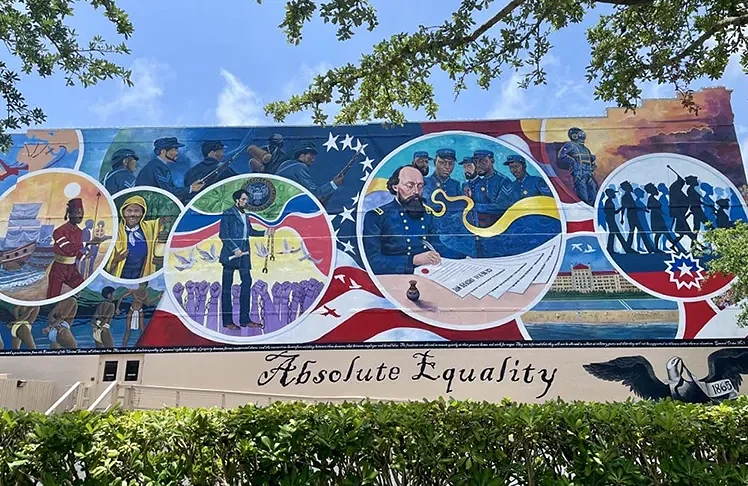 Artist Reginald C. Adams Uses Public Murals To Preserve And Amplify The History Of Juneteenth