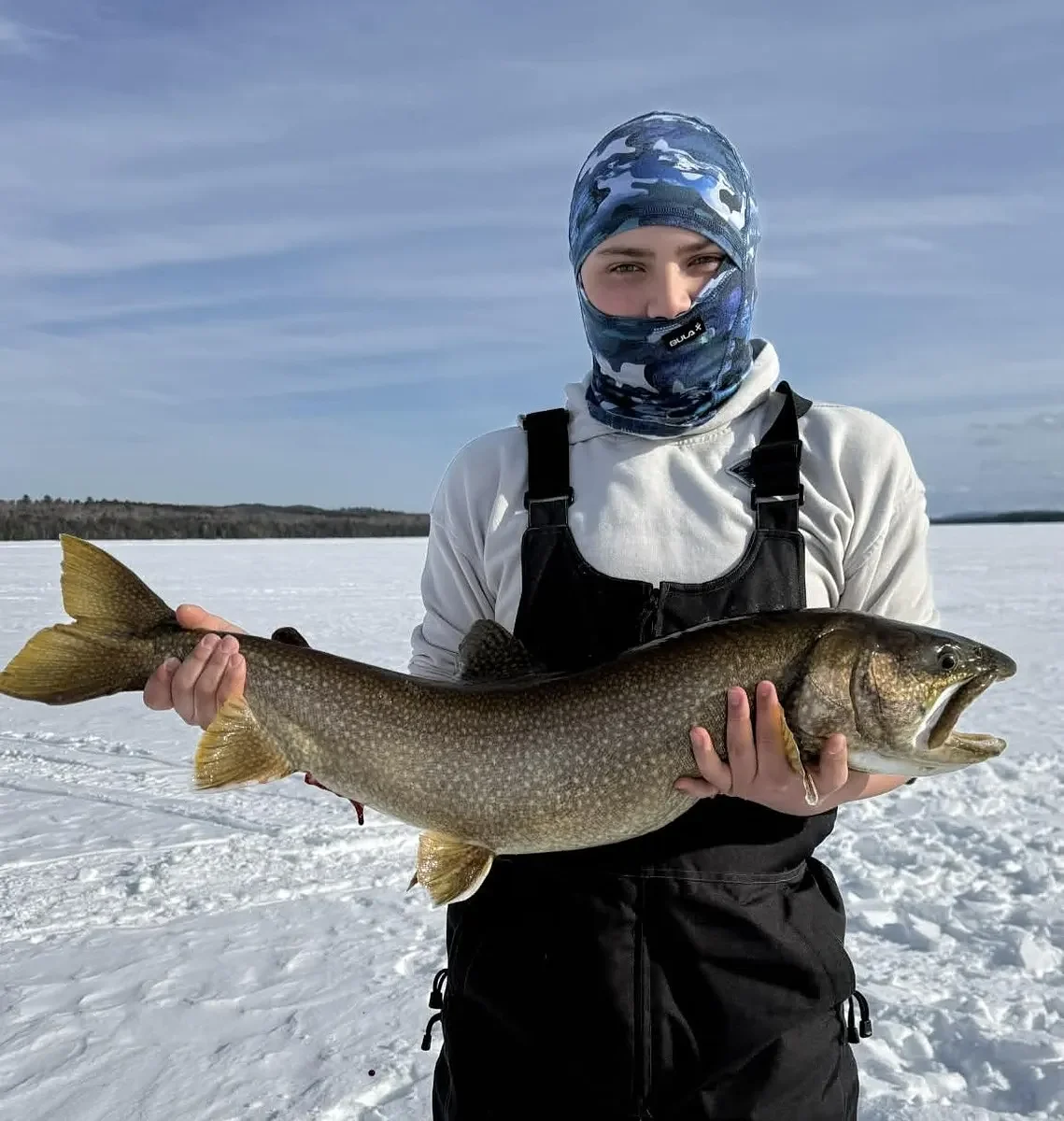 Maine teens land 15-pound lake trout during February vacation