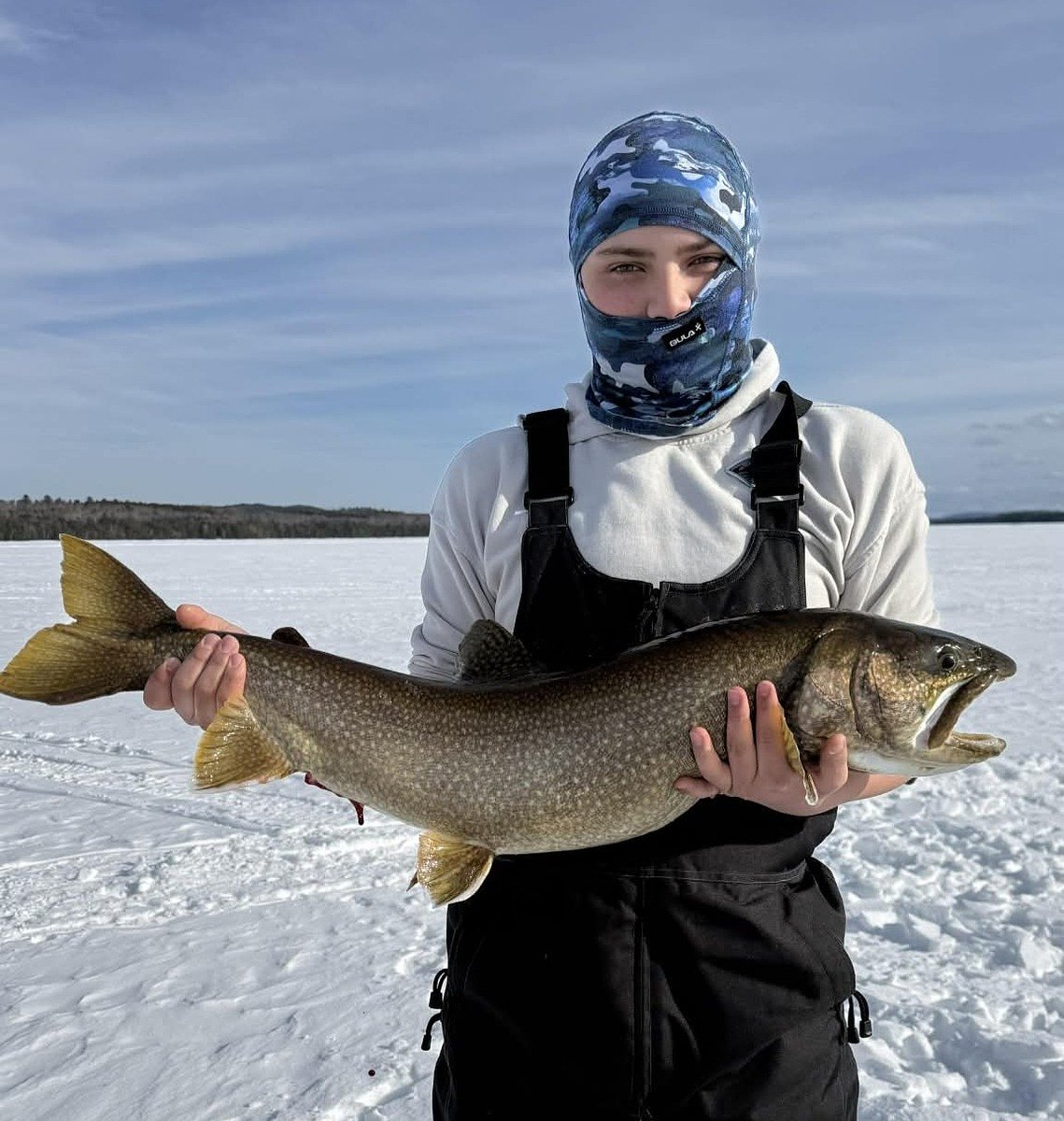 Maine teens land 15-pound lake trout during February vacation