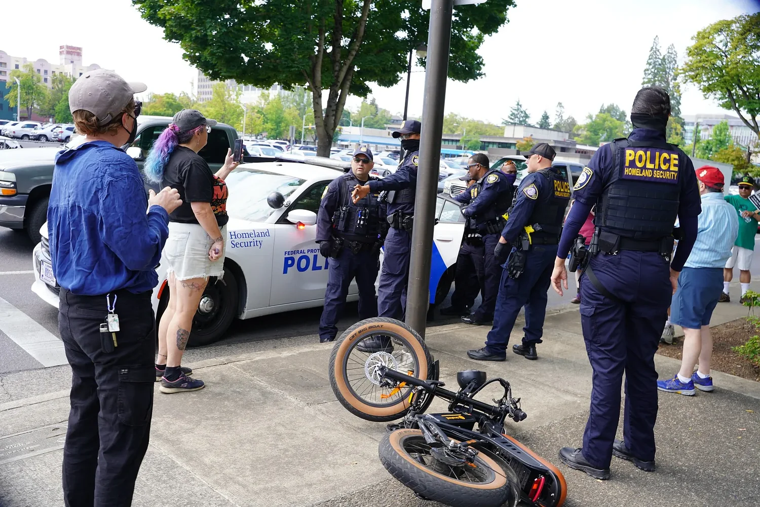 Man detained, federal police push protesters in downtown Eugene