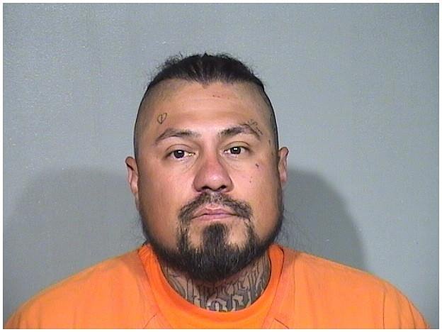 Motorcyclists surround vehicle in Lake in the Hills, one charged with attacking driver with helmet