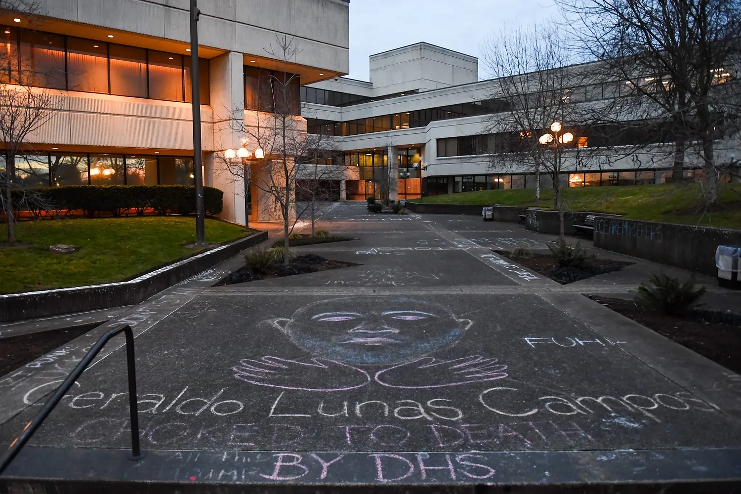 Chalk graffiti at federal building a snapshot of demonstrators’ discontent