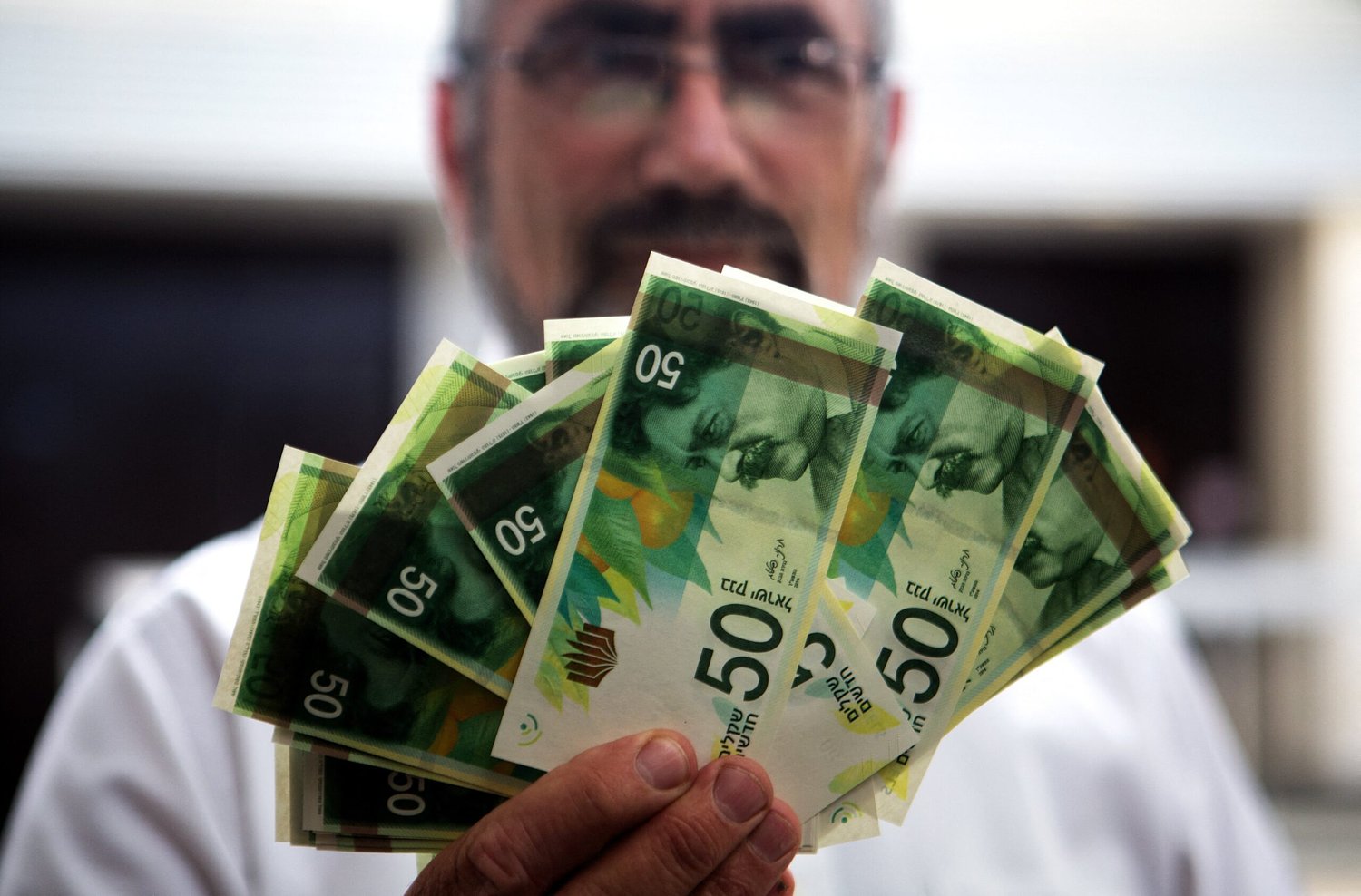 Financial experts say Israeli market is flourishing despite year and a half of war