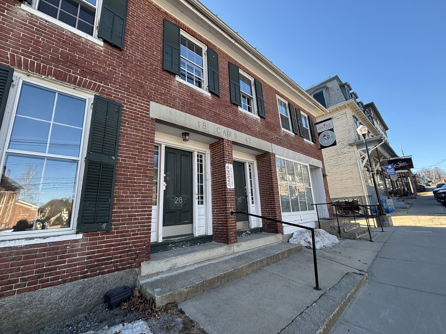 Local investor group buys 4 buildings in Peterborough, envisioning a lively future for downtown