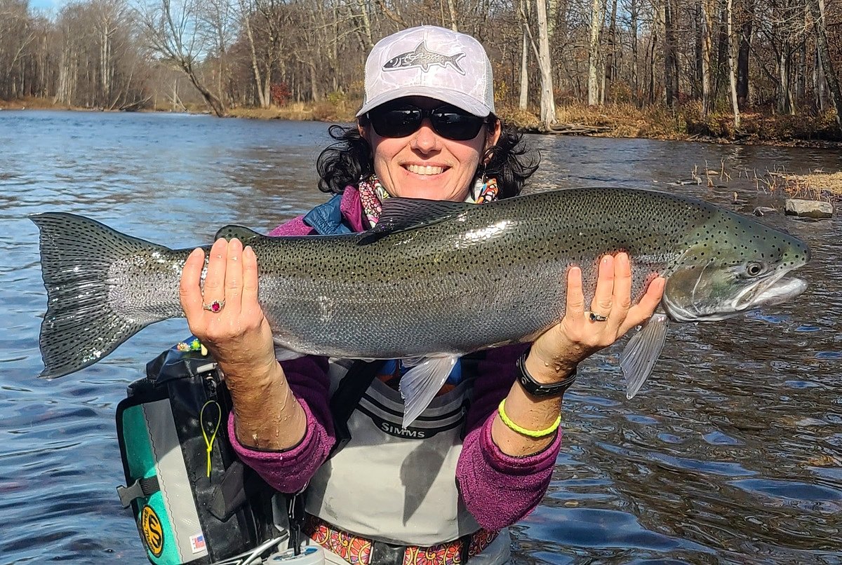 Maine woman battles challenging river to land a trophy trout