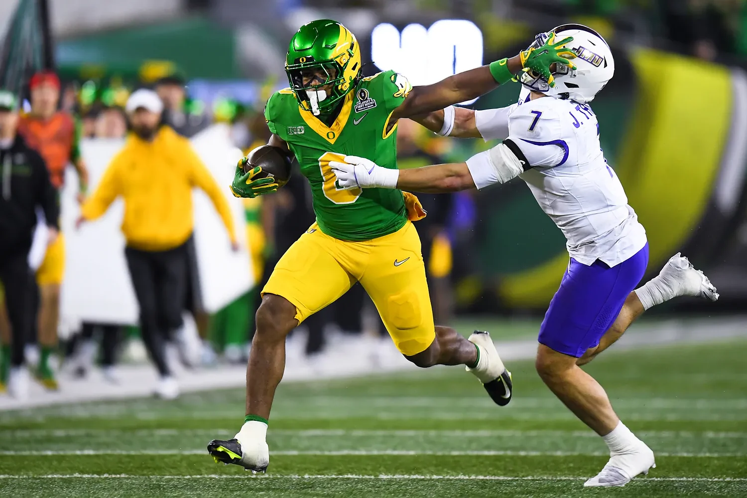 Ducks rout JMU, advance to Orange Bowl and set sights on the ‘standard’
