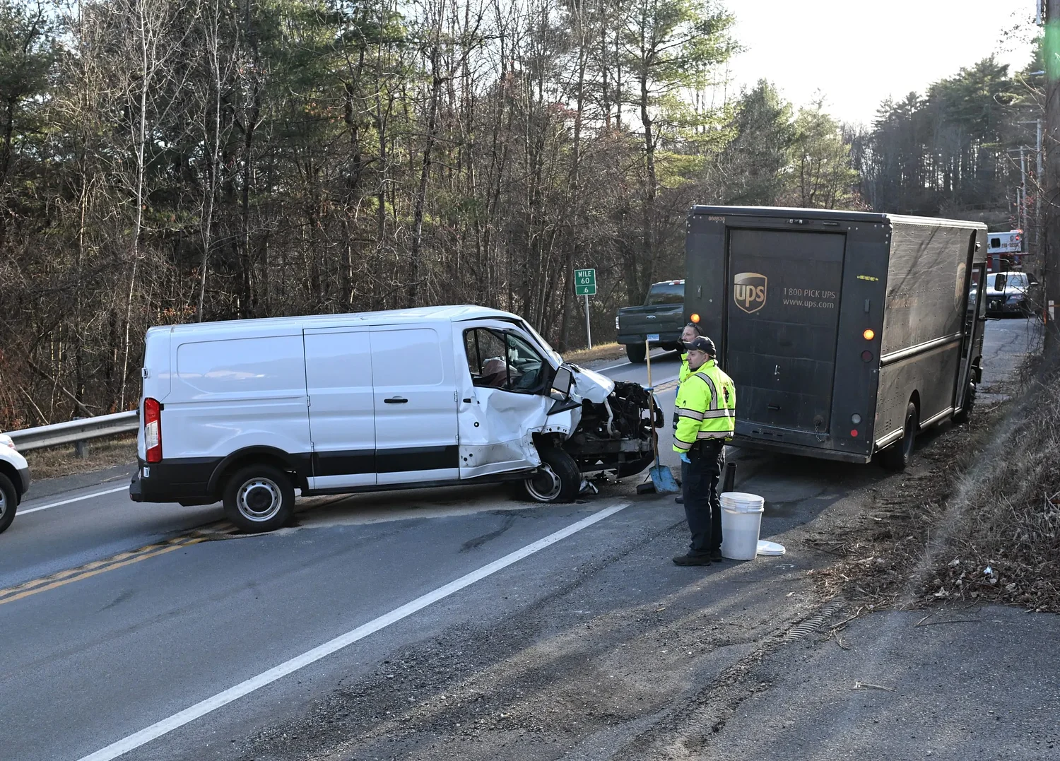 Driver injured after crashing into UPS truck in Erving