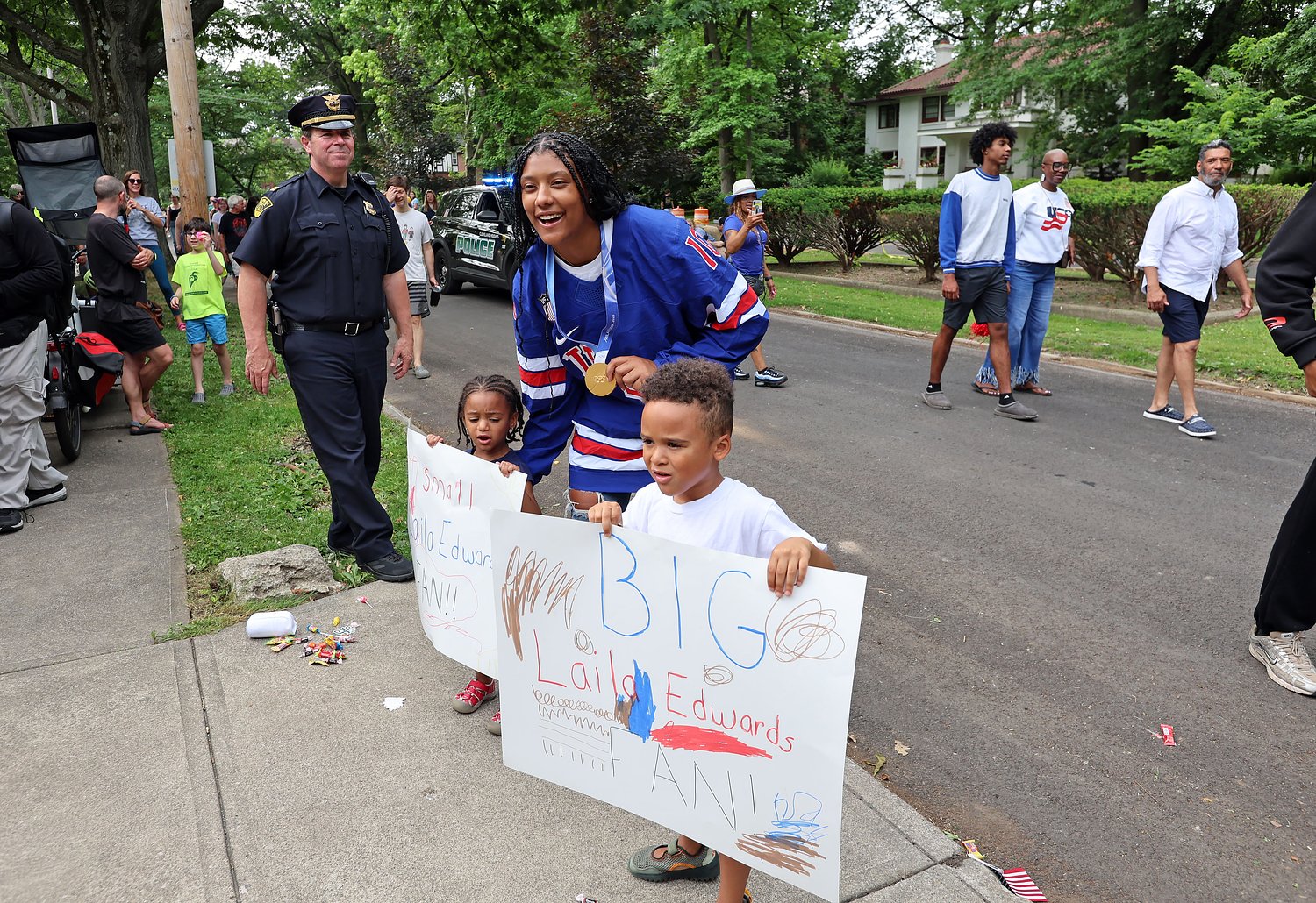 Cleveland Heights puts on a gold medal parade for hometown hockey legend Laila Edwards