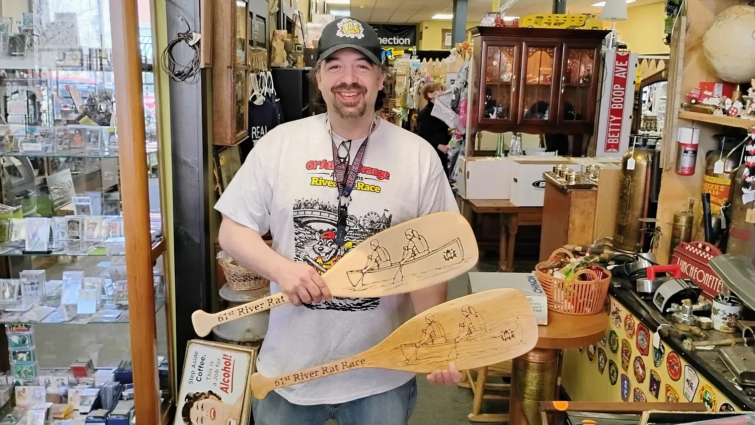 Athol business owner commissions custom paddles for River Rat Race participant