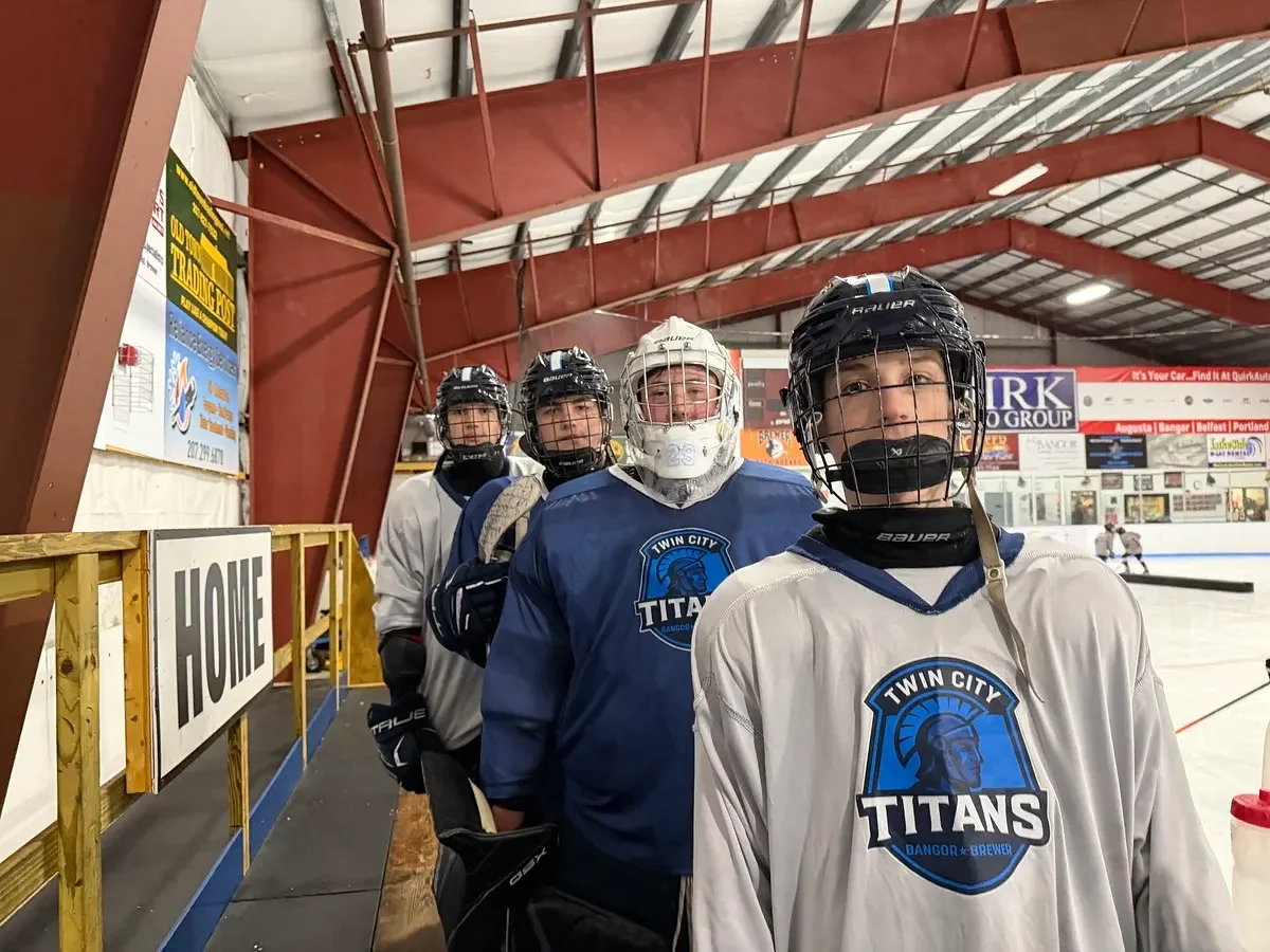 How much do these high school players love hockey? They travel 100 miles just to practice.