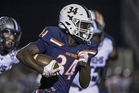 ‘I had to ball out for her’: Oswego RB shines as mom sees him play high school football for first time