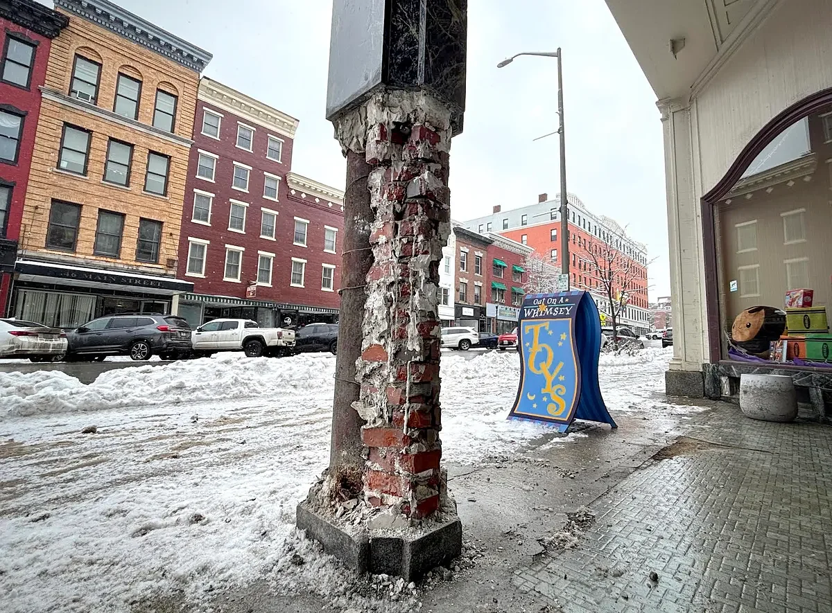 Man allegedly used hammer to destroy granite pillar outside downtown Bangor business