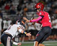 Malik Carter throws 5 TDs, Huntley tops McHenry to keep playoff hopes alive