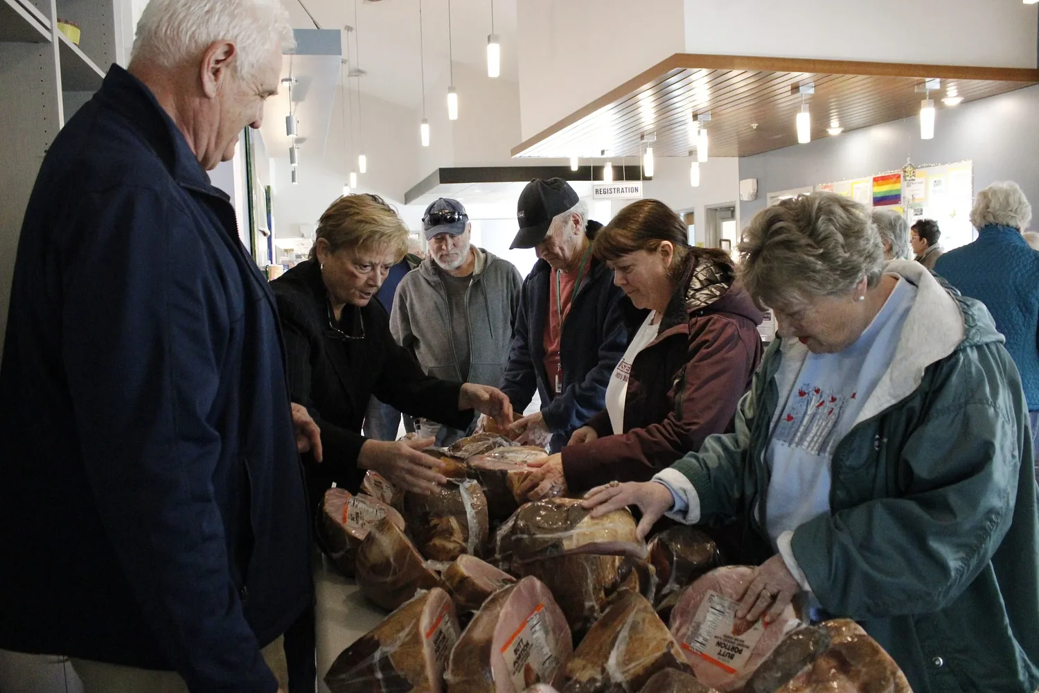 'A very rewarding event': Seniors, families pick up Easter hams from TRIAD distribution