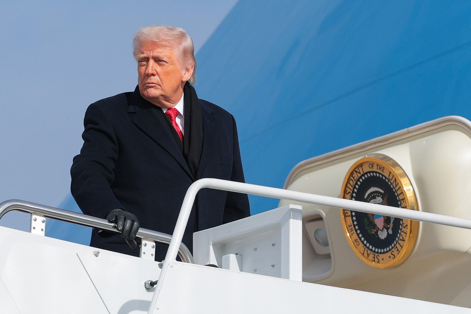 Trump touches down in Switzerland