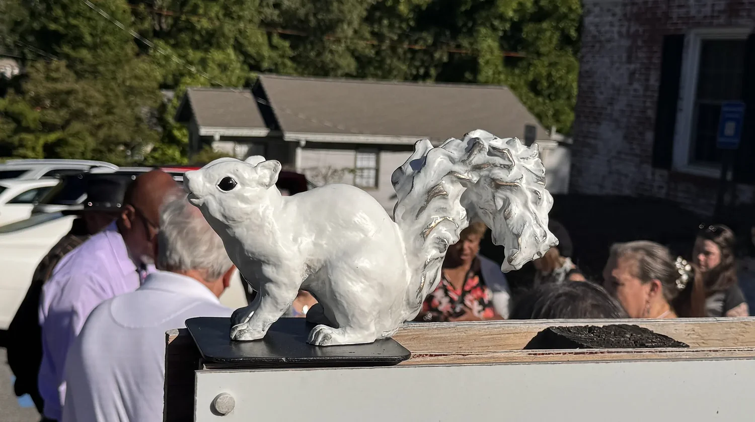 Norcross leaders and community members celebrate first batch of white squirrel statues
