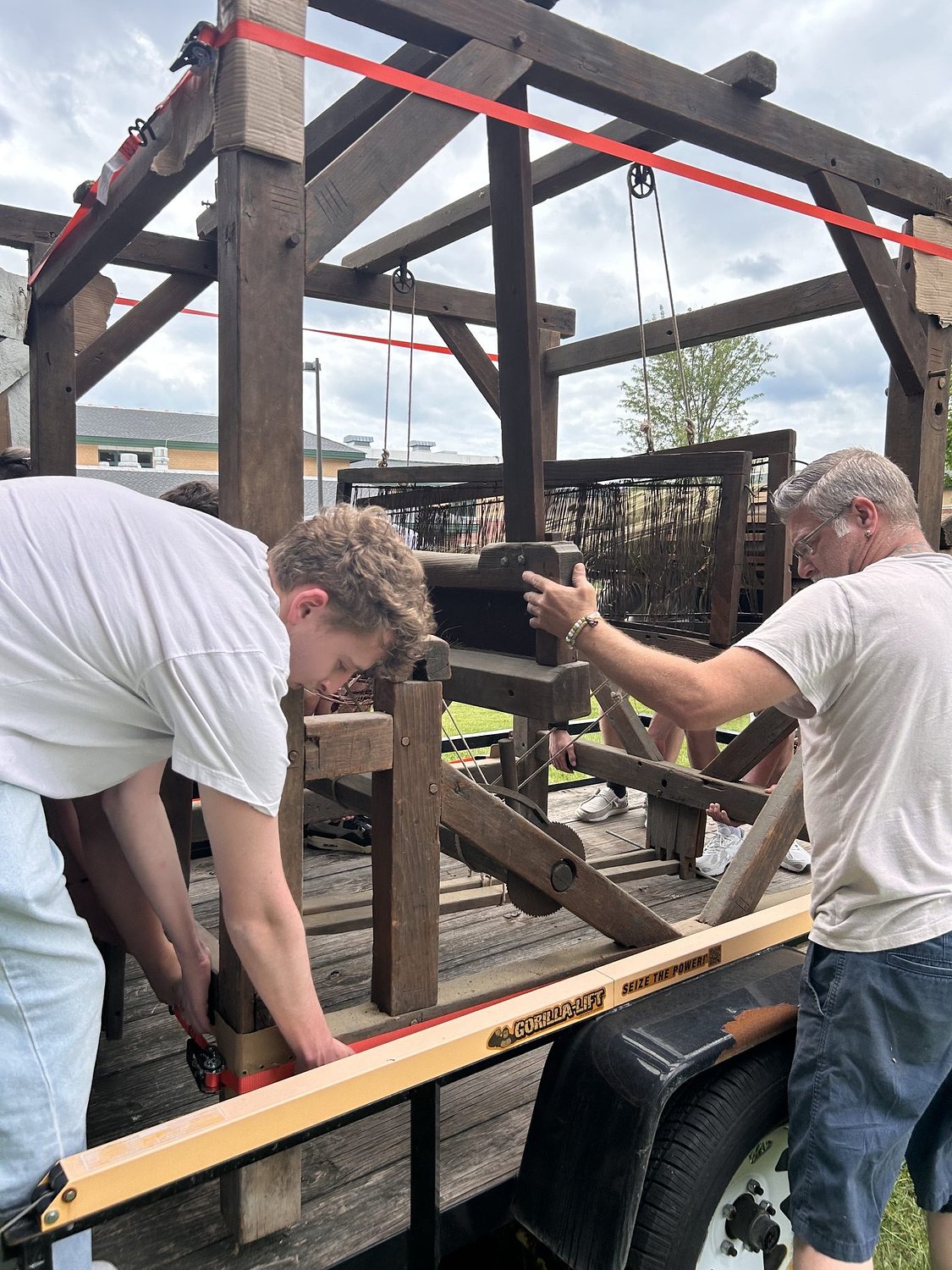 Students help move Revolutionary War-era loom at Hatfield Farm Museum