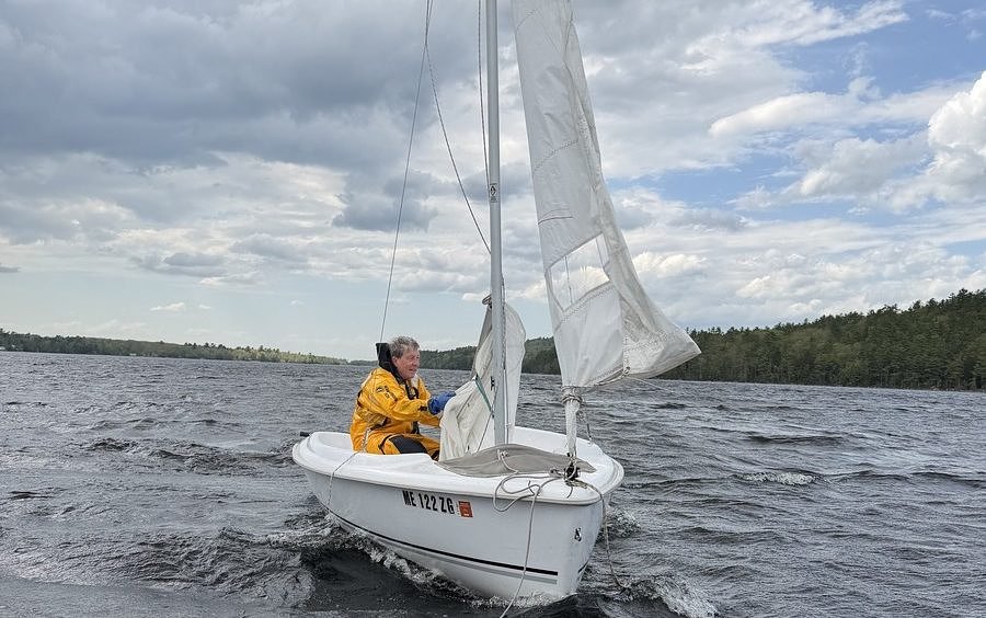 2 rescued after sailboat capsizes on Orland pond