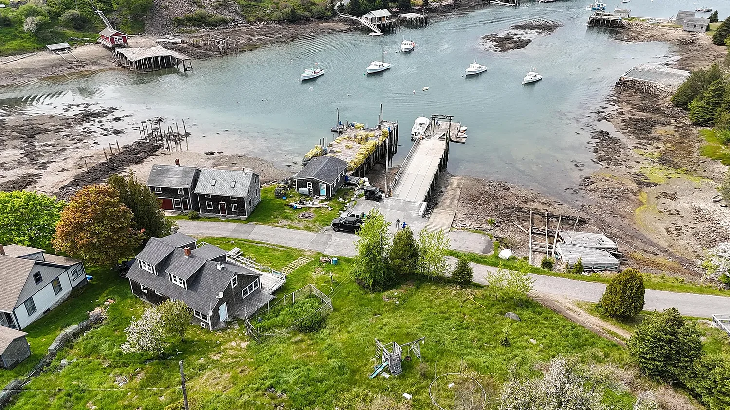 This harborfront island home selling for $495K comes with its own wharf