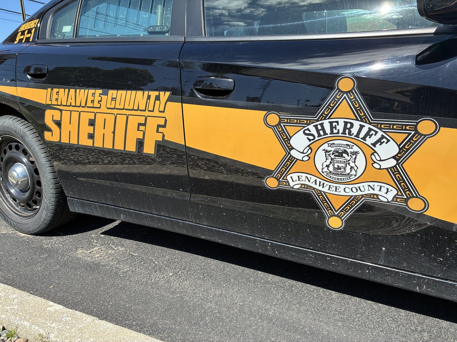 Man dies after running through Adrian yelling he was being chased