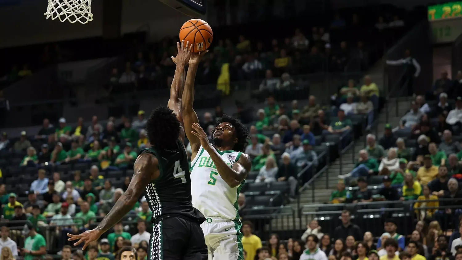 Mirror image: Oregon’s Takai Simpkins and his twin are leading from opposite sides of the country