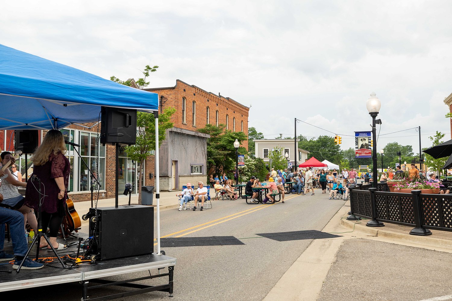 A Michigan village started closing streets on summer Wednesday nights. It draws thousands.